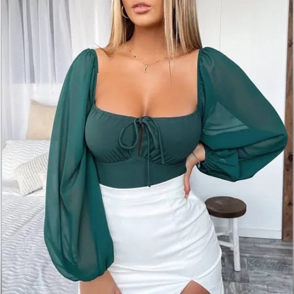Emerald green open back body suit